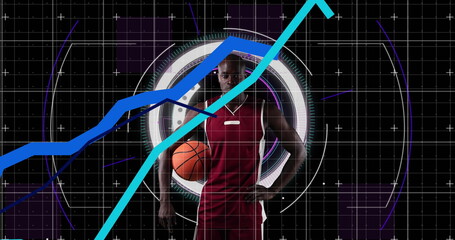 Graphs moving over portrait of african american male basketball player against round scanner