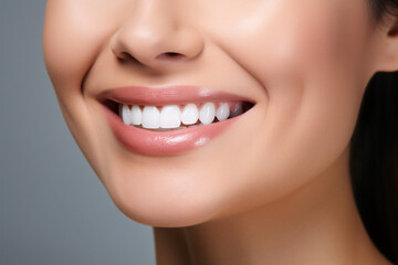 Woman's smile with white straight teeth