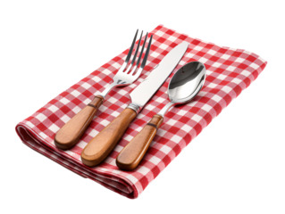 a fork knife spoon and a spoon on a red and white checkered napkin