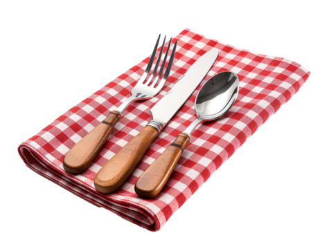 a fork knife spoon and a spoon on a red and white checkered napkin - Powered by Adobe
