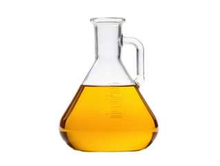 a glass beaker with yellow liquid