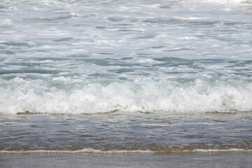 View of the surfs on the beach