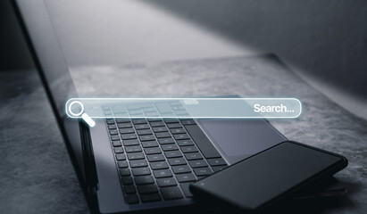 Desktop photo with laptop and smartphone with holographic search bar. Internet of things. Concept...