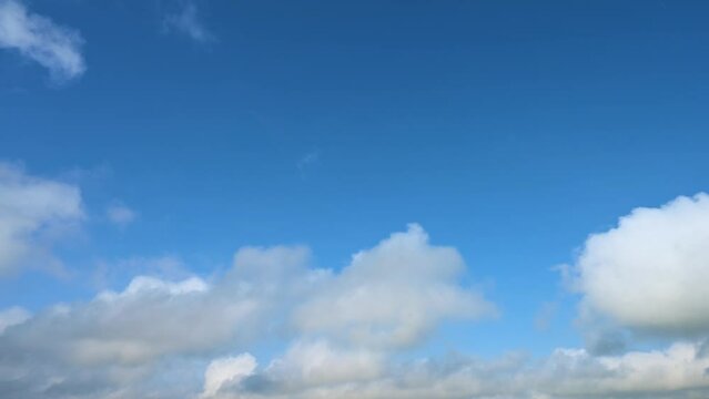 Clouds disperse and the blue sky appears, time lapse
