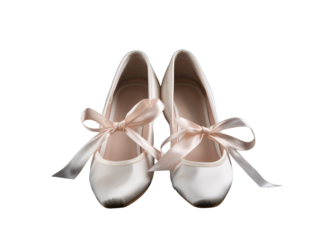 a pair of white shoes with pink bows