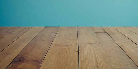 Minimalist Charm: Empty Wooden Table Against Light Blue Wallpaper Backdrop