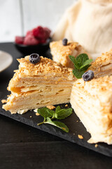 
Napoleon cake. dessert. on a wooden background. Sweet