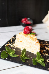 
Napoleon cake. dessert. on a wooden background. Sweet