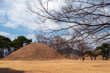 One of Daereungwon Ancient Tombs in Gyeongju, South Korea. Part of a UNESCO World Heritage Site with other Gyeongju Historic Areas.