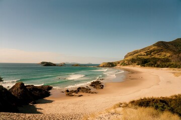Waves hit the rocky beach