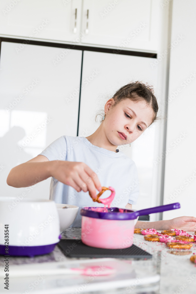 Sticker Young Chef Prepares Chocolate-Covered Treats in Sunny Kitchen