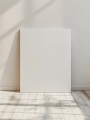 front view of one white blank canvas leaning against the wall 
