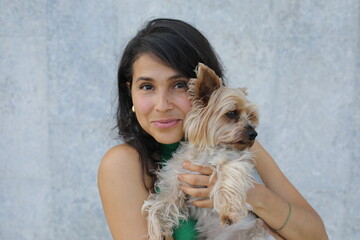 Pretty  woman with a very cute Yorkshire Terrier 