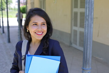 Private school ethnic female student wearing a preppy uniform 