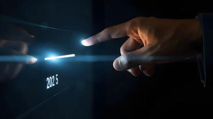 Businessman hand touching digital screen with a progress bar loading and the text 2025 floating on a dark background 