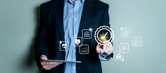 Quality certification assurance standardization concept, businessman touching certificate icons, industrial technology control standard, workflow management system and human.