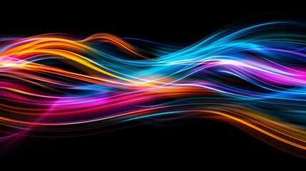 Colorful light trails on a black background, vibrant abstract art concept