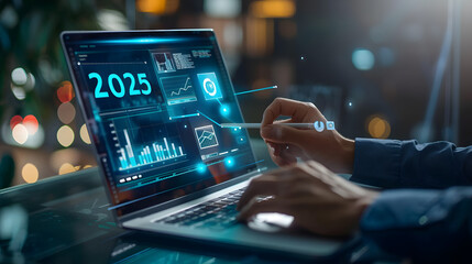 Businessman using a laptop and drawing a growth graph with a hologram of the numbers 2025 on a virtual screen for a business plan 