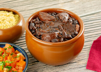 Brazilian Feijoada Food black bean stew with bacon, pork sausage and dried meat