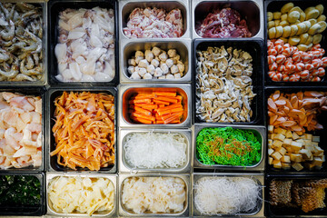 Thai barbecue buffet  or Moo Krata   ingredients tray, top view