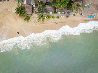Aerial view white sand sea beach wave with coconut palm tree