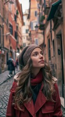 Fototapeta premium A woman wearing a red coat and a hat