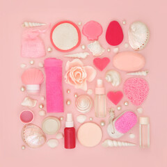 Spa and bath skincare treatment products with body care accessories for healthy skin on pink background. Abstract square design with decorative pearls and shells.
