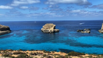 Comino Island Malta, Water scooters in between to rocks. Visiting caves in Comino . High quality photo
