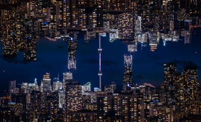 symmetry and mirrored geometry pattern, reflected skyscrapers of Toronto and modern buildings skyline abstract background, lines and tunnel futuristic technology concept