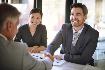 Business people, handshake and meeting success with agreement, onboarding or hiring in corporate...