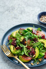 Fresh healthy avocado,  blood orange, beetroot salad