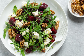 Fresh healthy beetroot, feta and walnut salad