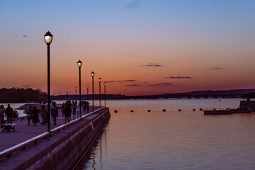 Scenic River side walkway with a beautiful sunset