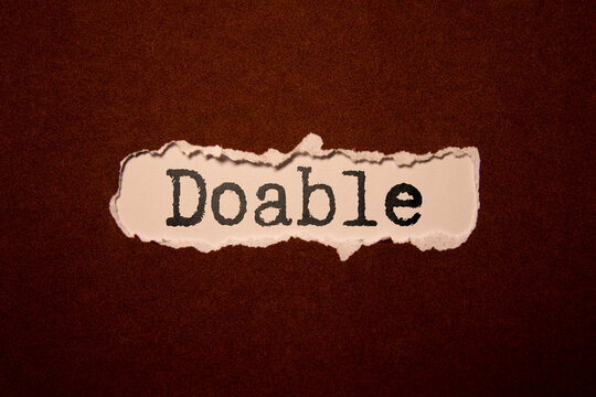 doable colorful word on the wooden background