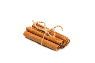 Cinnamon sticks isolated on white background. Cinnamon roll. Spicy spice for baking, desserts and drinks. Fragrant ground cinnamon.
