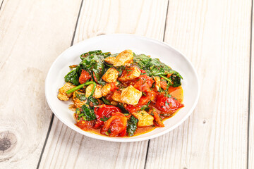 Chicken with tomato and spinach