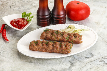 Kebab with beef served onion