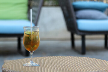 Iced tea on a rattan tray