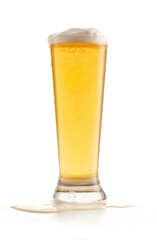 full glass of light beer with a frothy head, set against a white background. The beer's golden hue, bubbles, and slight spillage create a refreshing and inviting scene, ideal for bar and beverage-them