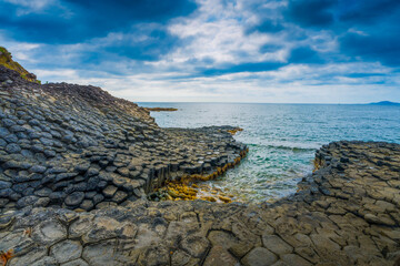 View of Ganh Da Dia or Da Dia Reef is a seashore area of uniformly interlocking basalt rock columns...