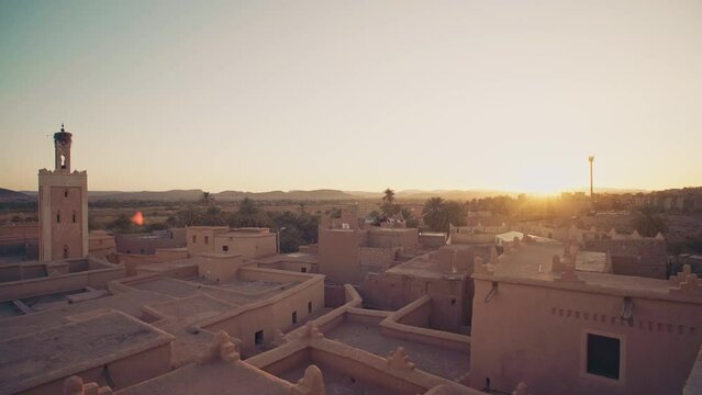 Ouarzazate, Morocco intermediate city village in Morocco. Sunset in the beautiful Moroccan landscape. Mud village in North Africa.