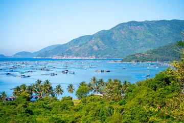 Aerial view of the lobster feeding farms, float fishing village in Vung Ro bay, Phu Yen, Vietnam. This is a very popular tourist destination.