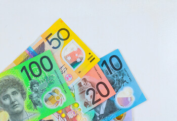 Australian dollar AUD is printed on polymer banknotes issued by National Bank of Australia in various denominations