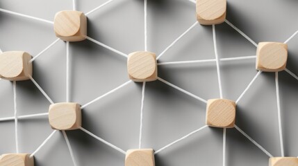 3D rendering of a network of wooden cubes connected by strings on a gray background