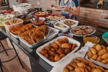 buffet table full of varied dishes