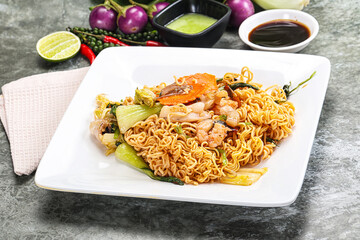 Asian cuisine - Fried noodles with seafood