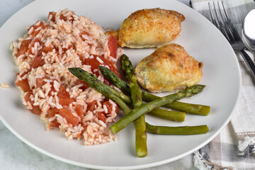  chicken thighs  with asparagus and rice