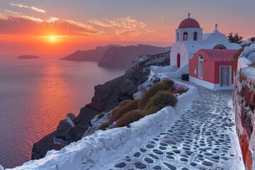 A picturesque sunrise over the Santorini caldera with Agios Minas church in the foreground