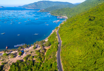 Aerial view of the lobster feeding farms, float fishing village in Vung Ro bay, Phu Yen, Vietnam. This is a very popular tourist destination.