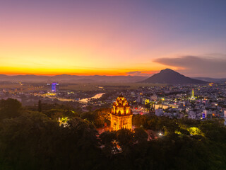 Obraz premium Aerial view of Nhan temple, tower is an artistic architectural work of Champa people in Tuy Hoa city, Phu Yen province, Vietnam. Sunset view